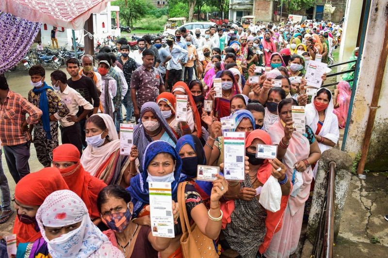 Beneficiaries wait in queues to receive COVID-19 vaccine dose at a vaccination centre in Jabalpur on July 8, 2021. (PTI Photo)