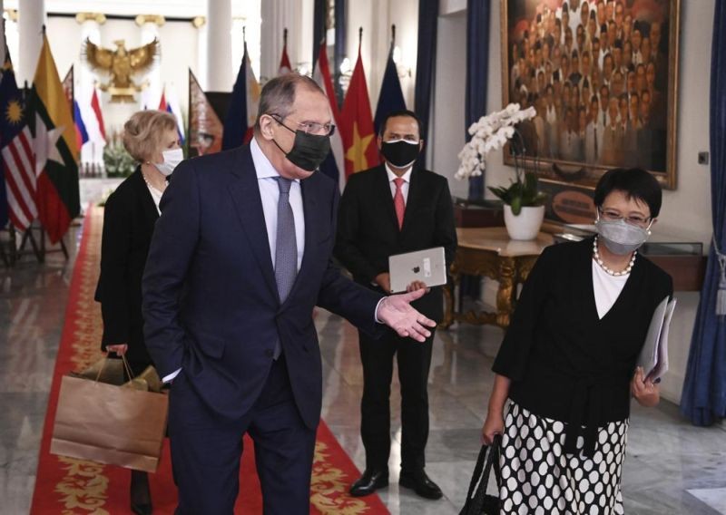 In this photo released by Indonesian Ministry of Foreign Affairs, Russian Foreign Minister Sergei Lavrov, left, walks with his Indonesian counterpart Marsudi, right, after their meeting in Jakarta, Indonesia on July 6, 2021. Russia's top diplomat expressed his backing for Southeast Asian efforts toward achieving peace in Myanmar on his visit Tuesday to Indonesia to demonstrate the region's importance to Moscow. (AP Photo)