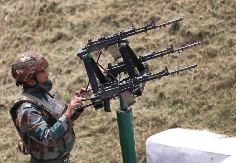 Akhnoor: An Indian Army soldier stands guard with an Anti Drone gun at Line of Control (LOC) ahead of the 75th Independence day, at Pallanwala sector in Akhnoor, Friday, Aug 13, 2021. (PTI Photo)