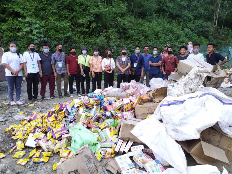 Chang Students' Union Tuensang Town (CSUTT) conducted a surprise checking on groceries and pharmacies in Tuensang town on August 5. A total of 36 shops were held with expired goods and later the goods were destroyed at the dumping site. (Morung Photo) 