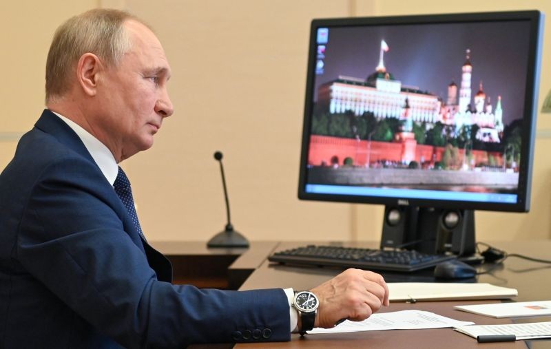 Russian President Vladimir Putin attends a meeting with members of Russia's Paralympic national team via videoconference at the Novo-Ogaryovo residence outside Moscow, Russia on August 9, 2021. (AP/PTI Photo)