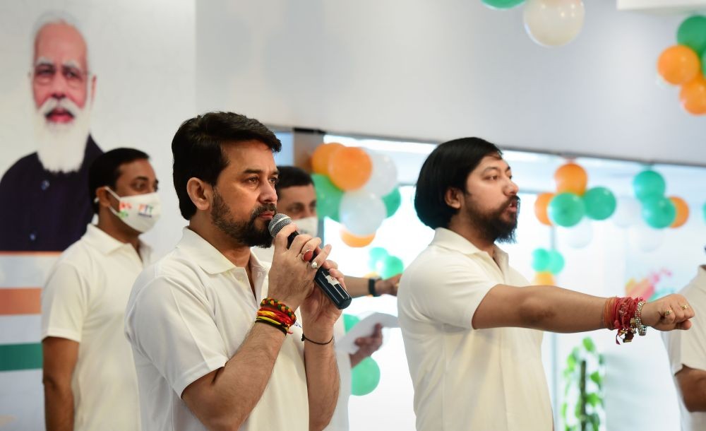 New Delhi: Union Minister for Youth Affairs and Sports Anurag Singh Thakur (L) with MOS Sports Nisith Pramanik takes pledge during flaging-off of 'Fit India Freedom Run' at Dhyanchand Stadium in New Delhi, Friday, Aug 13, 2021.   (PTI Photo/Kamal Kishore)