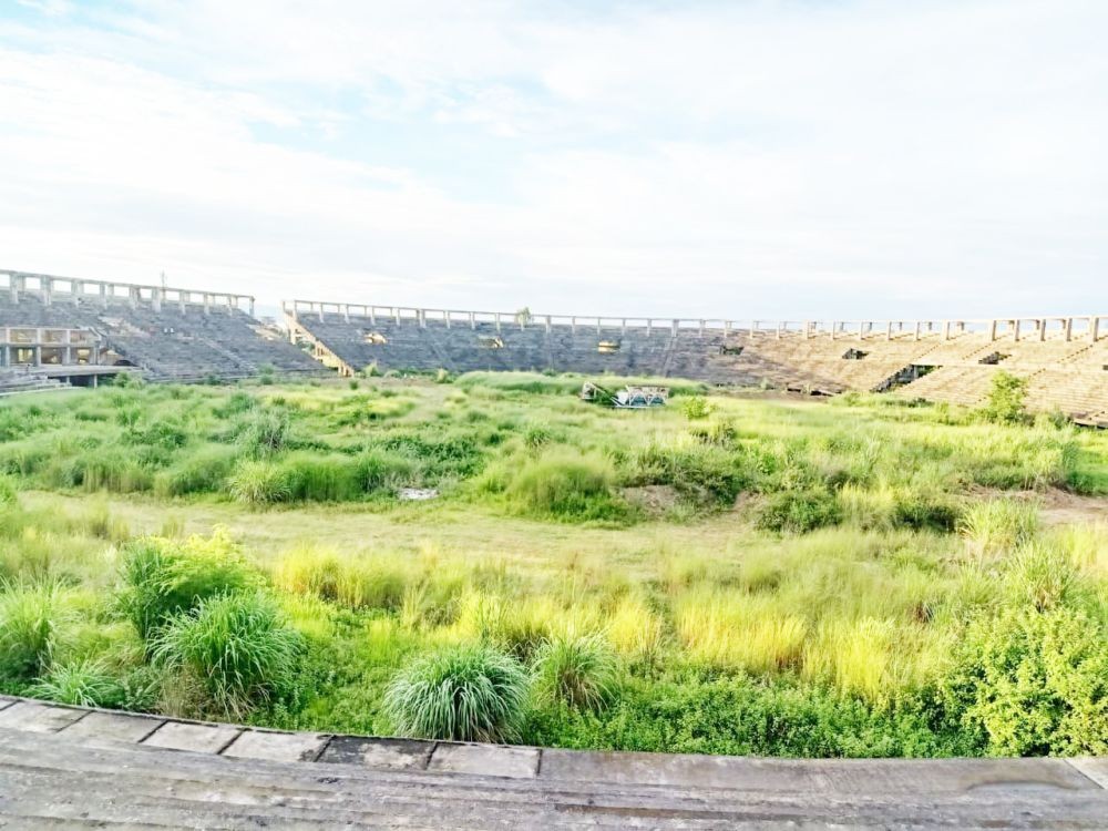In this image of the Multi-Disciplinary Sports Complex, Dimapur taken on August 20, the unfinished structures of the complex looks like the ruins of a medieval coliseum. This Multi-Disciplinary Sports Complex has been under construction since 2005. According to the Comptroller and Auditor General (CAG) of India report for the year 2014-15, the Department of Youth Resources and Sports Nagaland took up the project in a phased manner in 2005. A per the terms and conditions, the work was to be completed by 2009. (Morung Photo)