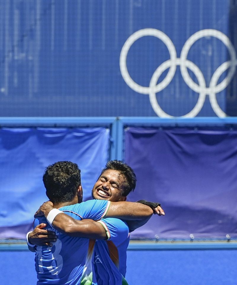 Indian players Harmanpreet and Vivek greet each other as they celebrate their victory over Germany in the men's field hockey bronze medal match, at the 2020 Summer Olympics, in Tokyo on August 5, 2021. India won the match, 5-4. (PTI Photo)