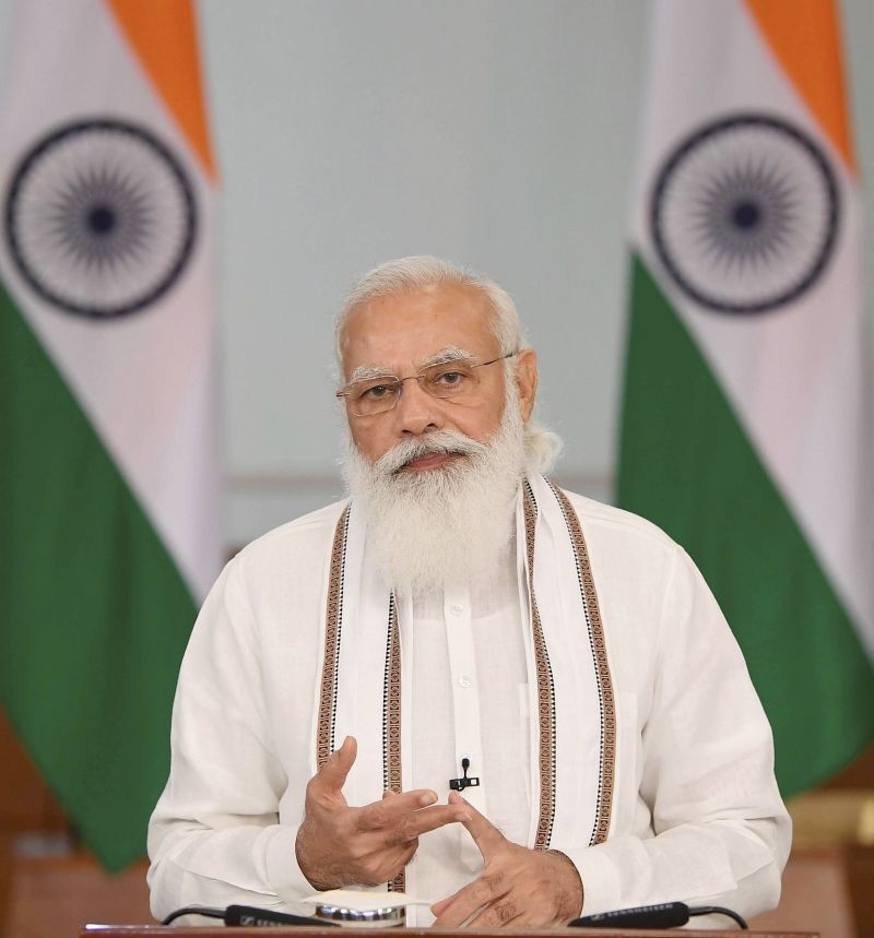 Prime Minister Narendra Modi addresses the launch of the digital payment solution e-RUPI, through video conferencing, in New Delhi. (PTI Photo)
