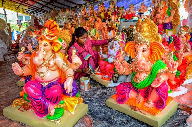 An artist paints an idol of lord Ganesha at a workshop ahead of the 'Ganesh Chaturthi' festival, in Amritsar on August 26, 2021. (PTI Photo)