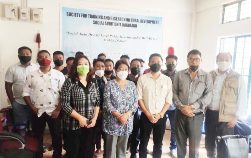 Dignitaries during social audit public hearing under MGNREGS at Wokha on August 11.