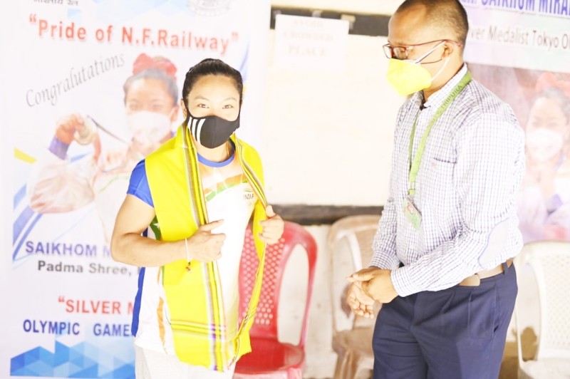 The ICFAI University Tripura felicitated to Saikhom Mirabai Chanu for her outstanding performance in Tokyo Olympics in weightlifting and winning of a Silver medal for India. The ICFAI University Staff members reached to her residence at Imphal on August 2 to felicitate Chanu. (Photo Courtesy: ICFAI University Tripura)