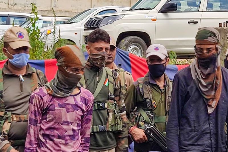 Police personnel arrested two newly recruited militants of Hizb-ul-Mujahideen Outfit in Kishtwar district on August 9, 2021. (PTI Photo)