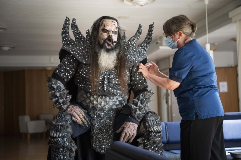 Rovaniemi: Mr Lordi of the Finnish hard rock band Lordi receives his second Covid-19 vaccination from nurse Paula Ylitalo in Rovaniemi, Finland, Sunday, Aug. 1, 2021. AP/PTI