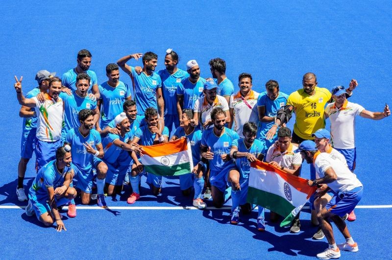 Indian players pose for group photographs as they celebrate their victory over Germany in the men's field hockey bronze medal match, at the 2020 Summer Olympics, in Tokyo on August 5, 2021. India won the match, 5-4. (PTI Photo)