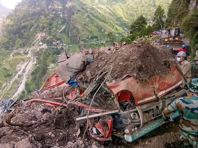 **EDS: TWITTER IMAGE POSTED BY @suryacommand** Kinnaur: A vehicle buried under the debris after a landslide yesterday in Kinnaur district, Thursday, Aug 12, 2021. (PTI Photo)
