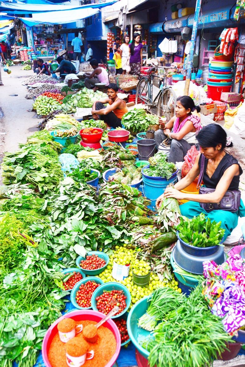 Vendor selling vegetables and other food items in New Market, Dimapur. (Morung Photo)