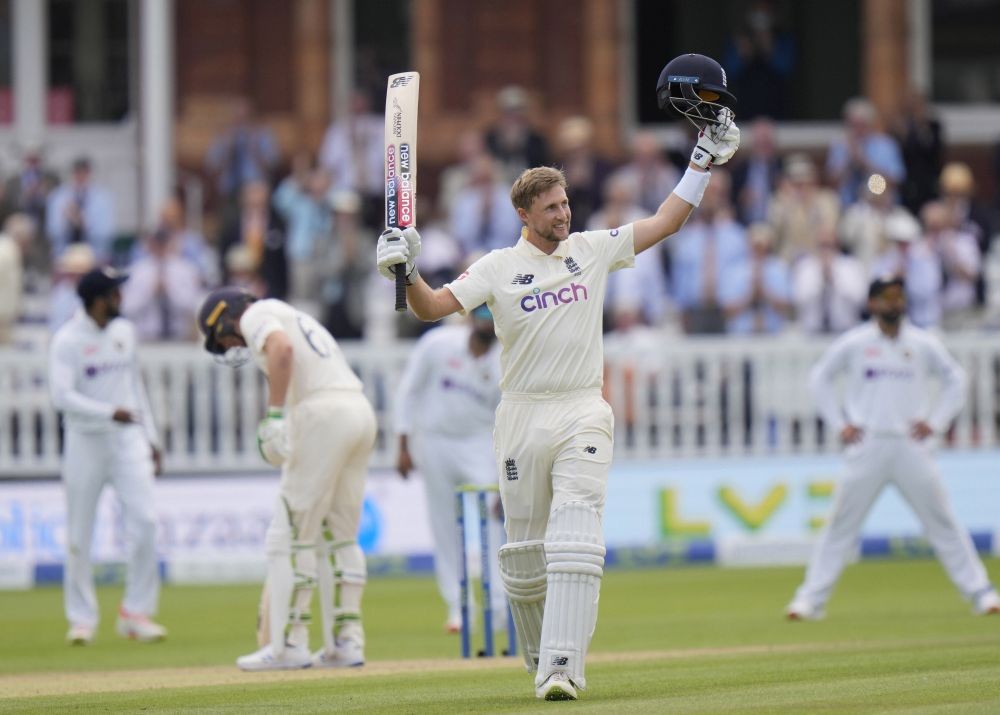 London: England's Joe Root celebrates after scoring 100 runs not out during the third day of the 2nd cricket test between England and India at Lord's cricket ground in London, Saturday, Aug. 14, 2021. AP/PTI