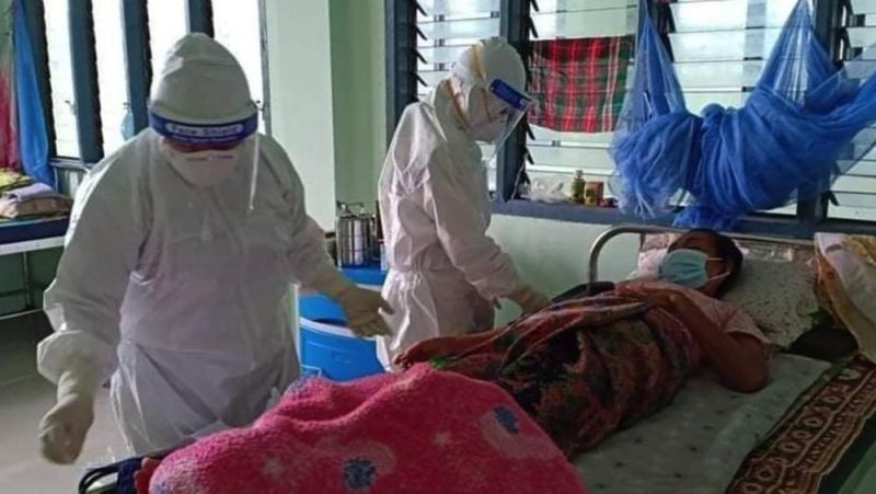 Democratic Karen Buddhist Army medics treat a COVID patient at one of their health facilities, in Karen State, Myanmar, on Aug 11, 2021. Independent ethnic organizations that have been providing health care in Myanmar after the collapse of the country's central health system are now facing serious challenges of their own. (AP Photo)