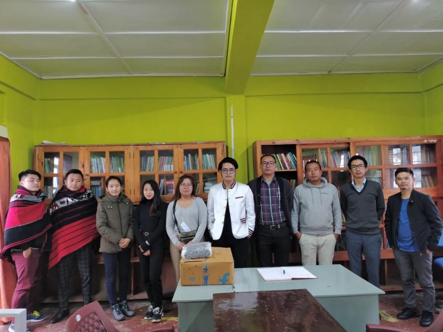 Library books and masks received by Kigwema village student’s union office bearers along with Vision Trinity Club members. (Photo Courtesy: Vision Trinity Club)