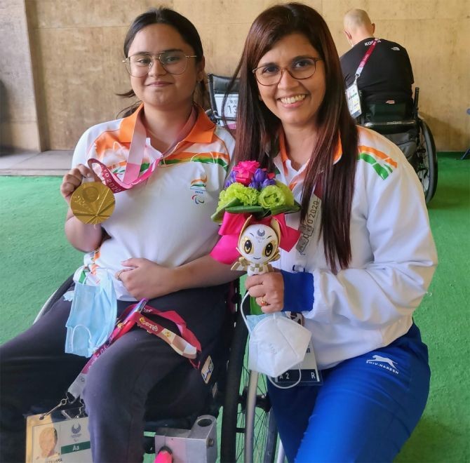 Tokyo Paralympics gold medallist Avani Lekhara with her coach Suma Shirur. Photograph: Sports Authority of India