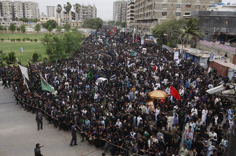 Shiite Muslims attend a procession to mark Ashoura, in Karachi, Pakistan on August 19, 2021. Ashoura falls on the 10th day of Muharram, the first month of the Islamic calendar, when Shiites mourn the death of Hussein, the grandson of the Prophet Muhammad, at the Battle of Karbala in present-day Iraq in the 7th century. (AP/PTI Photo)