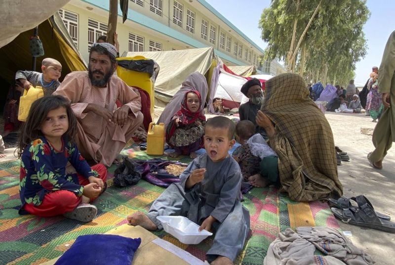 Internally displaced Afghans who fled their home due to fighting between the Taliban and Afghan security personnel, are seen at a camp in Daman district of Kandahar province south of Kabul, Afghanistan on August 5, 2021. (AP Photo)