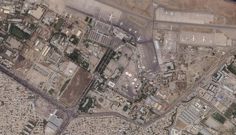 This satellite photo provided by Planet Labs Inc. shows traffic trying to reach the civilian side of Kabul International Airport, also known as Hamid Karzai International Airport on August 17, 2021. The Pentagon said Tuesday that U.S. commanders are communicating with the Taliban as they work to evacuate thousands of people through the airport. The Taliban cleared the civilian side of the airport Tuesday and control access to it. (AP/PTI Photo)