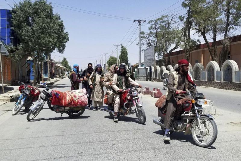 Taliban fighters patrol inside the city of Ghazni, southwest of Kabul, Afghanistan, Thursday, Aug. 12, 2021. The Taliban captured the provincial capital near Kabul on Thursday, the 10th the insurgents have taken over a weeklong blitz across Afghanistan as the U.S. and NATO prepare to withdraw entirely from the country after decades of war. (AP Photo)