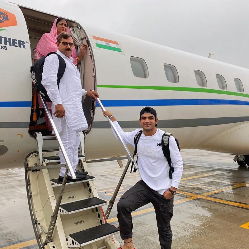 **EDS: TWITTER IMAGE POSTED BY @Neeraj_chopra1 ON SATURDAY, SEPT. 11, 2021** New Delhi: Olympic gold medallist Neeraj Chopra with his parents. (PTI Photo)