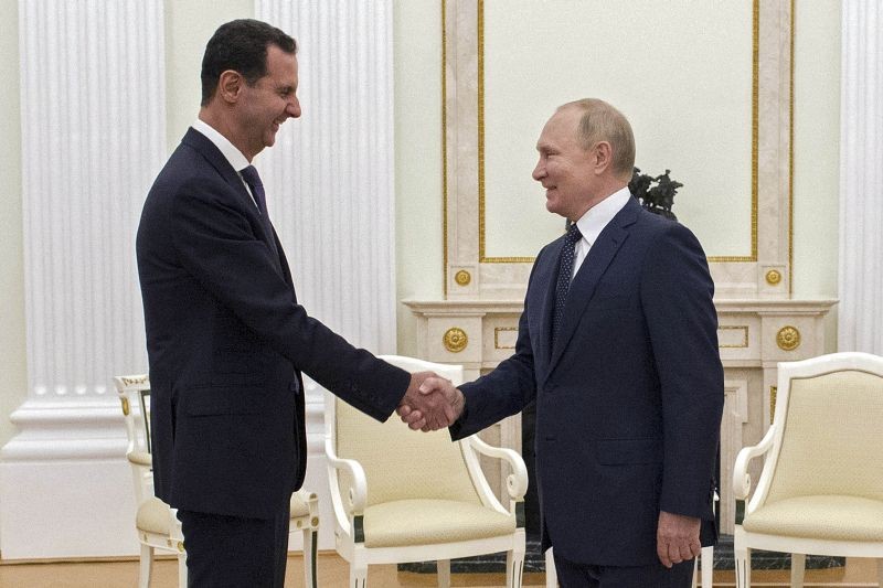 Russian President Vladimir Putin, right, greets Syrian President Bashar Assad during their meeting in the Kremlin in Moscow, Russia on September 13, 2021. (AP/PTI Photo)