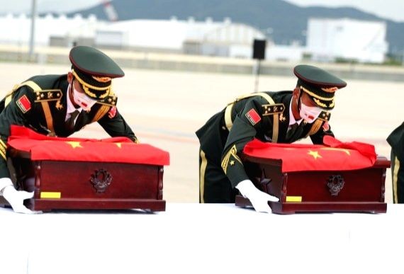 Chinese soldiers prepare to carry to plane coffins containing remains of Chinese soldiers killed in the 1950-53 Korean War during a repatriation ceremony at Incheon International Airport in Incheon, the Republic of Korea (ROK), September 2, 2021. (IANS Photo)