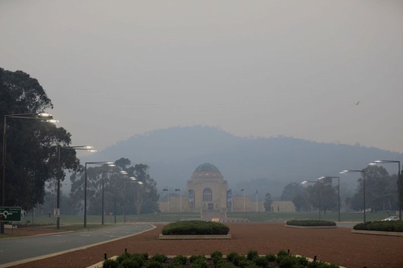Photo taken on Dec. 17, 2019 shows the smoke-shrouded Australian War Memorial in Canberra, Australia.. (IANS File Photo)