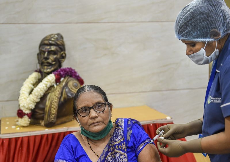 A health worker inoculates a beneficiary with a dose of Covid-19 coronavirus vaccine in Mumbai on September 2, 2021. (PTI Photo)