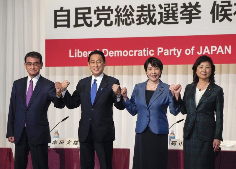 Candidates for the presidential election of the ruling Liberal Democratic Party pose prior to a joint news conference at the party's headquarters in Tokyo, Japan on September 17, 2021. The contenders are from left to right, Taro Kono, the cabinet minister in charge of vaccinations, Fumio Kishida, former foreign minister, Sanae Takaichi, former internal affairs minister, and Seiko Noda, former internal affairs minister. Official election campaigning kicked off Friday for the new head of Japan’s governing party LDP, whose winner is almost assured to become next Japanese prime minister.(AP Photo )