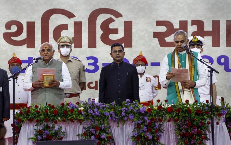 Bhupendra Patel takes oath as new Chief Minister of Gujarat administered by Governor Acharya Devvrat during a swearing-in ceremony at Raj Bhavan in Gandhinagar on September 13, 2021. (PTI Photo)