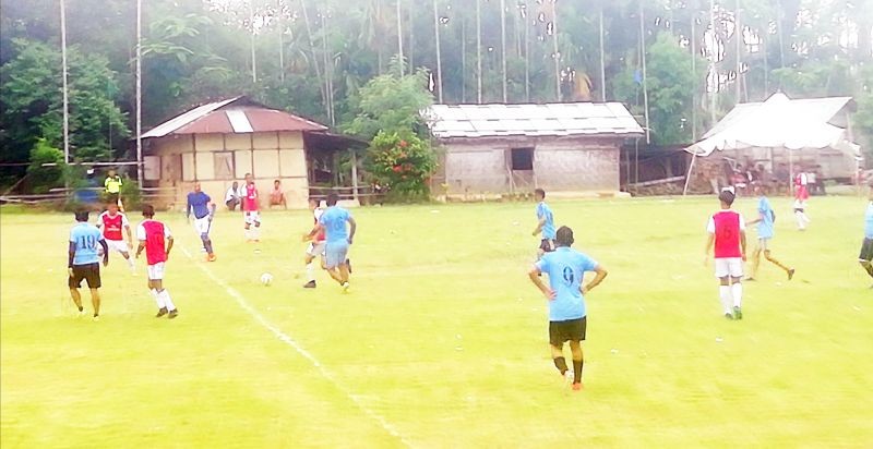 Match between Hoito FC (Red) and KGSA (Blue) at Suhoi Village on Monday.