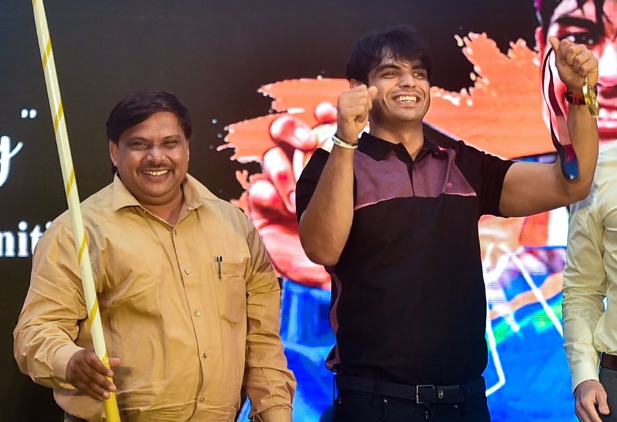 Kolkata: Tokyo Olympics 2020 gold medalist Neeraj Chopra shows his medal during a talk show 'Tahader Katha' (Their Story) in Kolkata, Wednesday, Sept 15, 2021. (PTI Photo/Swapan Mahapatra)