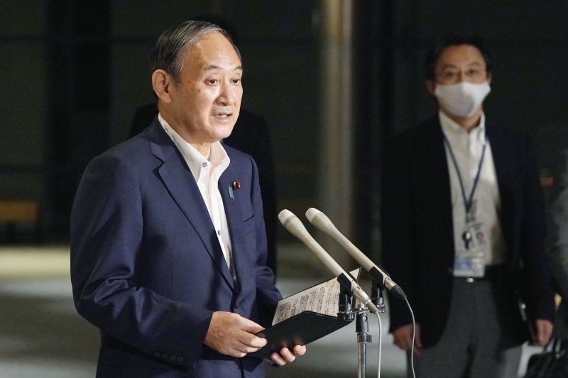 Japanese Prime Minister Yoshihide Suga speaks to reporters about lifting of a state of emergency at his official residence in Tokyo on September 27, 2021.  (AP/PTI Photo)