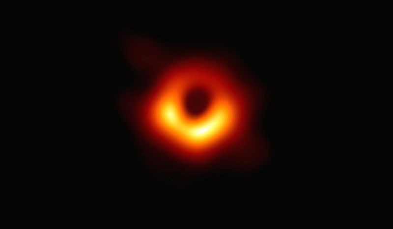 The image -- taken by a network of eight telescopes across the world -- shows luminous gas swirling around a super-massive black hole 55 million light-years away at the centre of "Messier 87. (IANS Photo)