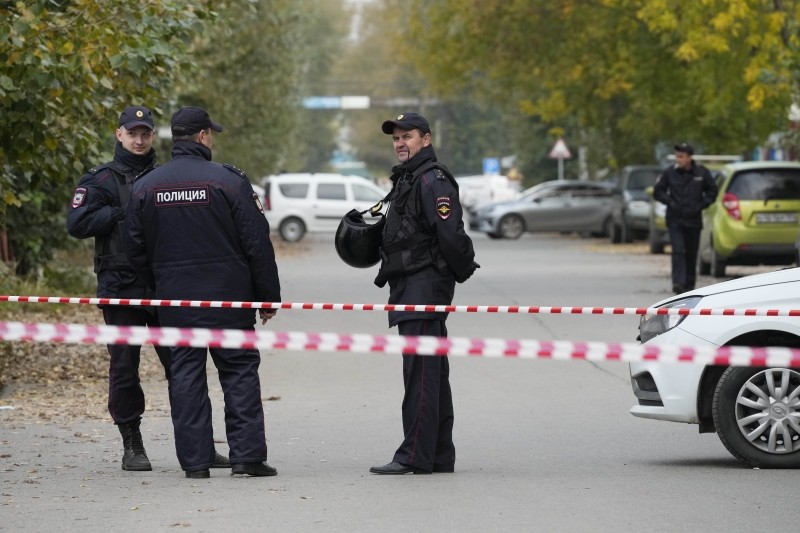 Perm: Police officers guard an area outside the Perm State University after a shooting in Perm, about 1,100 kilometers (700 miles) east of Moscow, Russia, Tuesday, Sept. 21, 2021. (AP/PTI Photo)