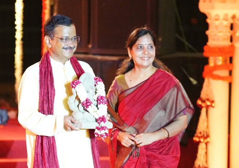 **EDS: IMAGE PROVIDED BY CM OFFICE** New Delhi: Delhi Chief Minister Arvind Kejriwal along with his wife Sunita participates in ‘Dilli Ki Ganesh Chaturthi’ program, in New Delhi, Friday, Sep 10, 2021. (PTI Photo)