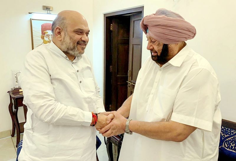 In this file image dated Thursday, June 27, 2019, Home Minister Amit Shah meets with Punjab Chief Minister Capt Amarinder Singh, in New Delhi. Singh reached the residence of Home Minister Amit Shah on September 29, 2021. (PTI File Photo)