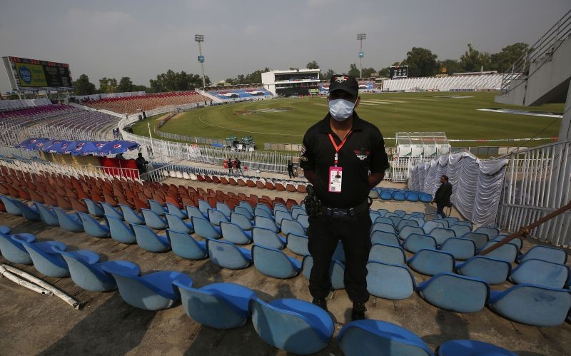 A Pakistani police officer stands guard an enclosure of the Pindi Cricket Stadium before the stat of the first one day international cricket match between Pakistan and New Zealand at the Pindi Cricket Stadium, in Rawalpindi, Pakistan on September 17, 2021. The limited-overs series between Pakistan and New Zealand has been postponed due to security concerns of the Kiwis. (AP/PTI Photo)