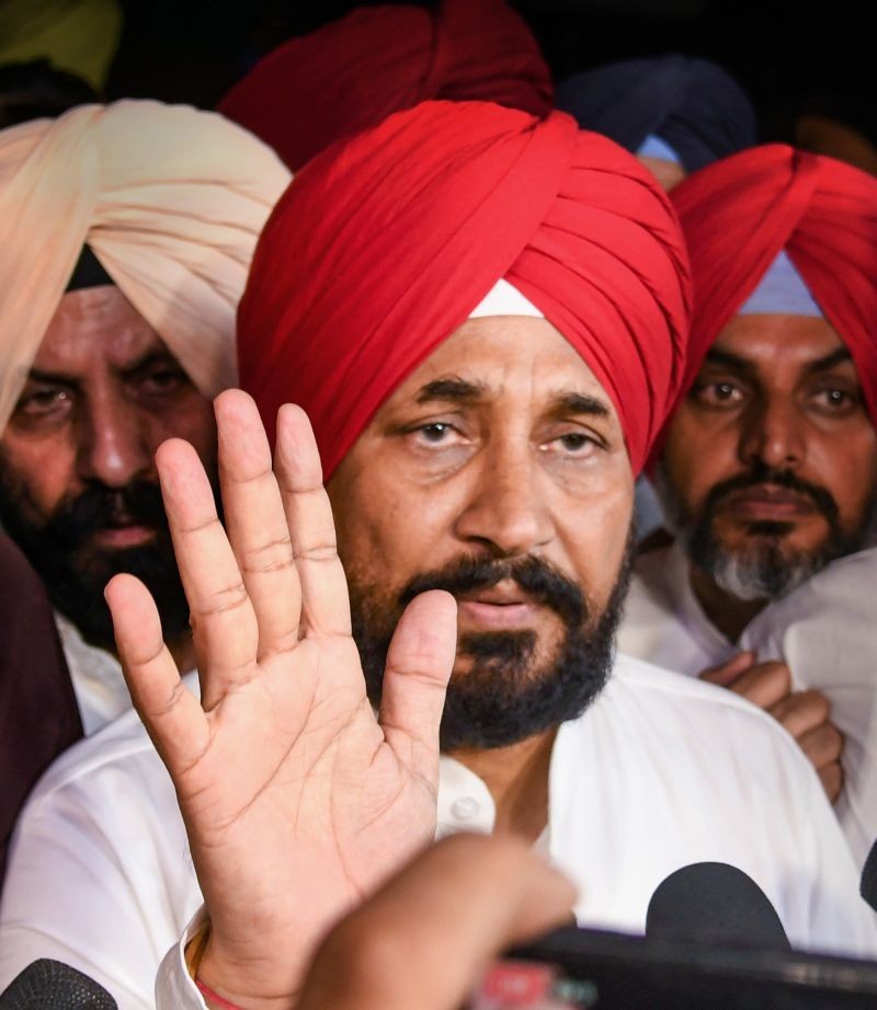 Punjab CM Designate Charanjit Singh Channi and other Congress leaders after the former was announced as the next CM of Punjab, outside Governor's residence in Chandigarh on September 19, 2021. (PTI Photo)