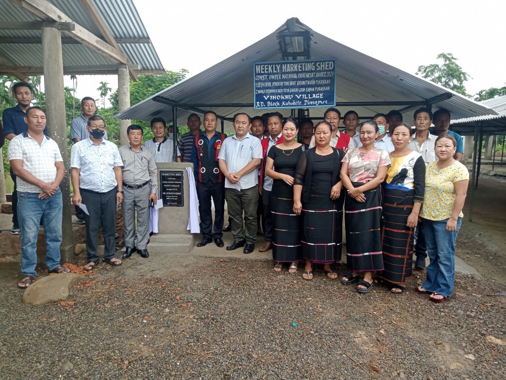 Project Director, DRDA Dimapur with other officials of the department and village elders at the inauguration of weekly market shed at Vihokhu village on September 17.