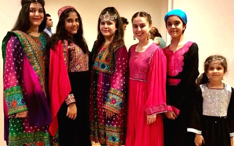 Afghan women protest Taliban's hijab diktat by sharing photos in colourful dresses. (IANS Photo)