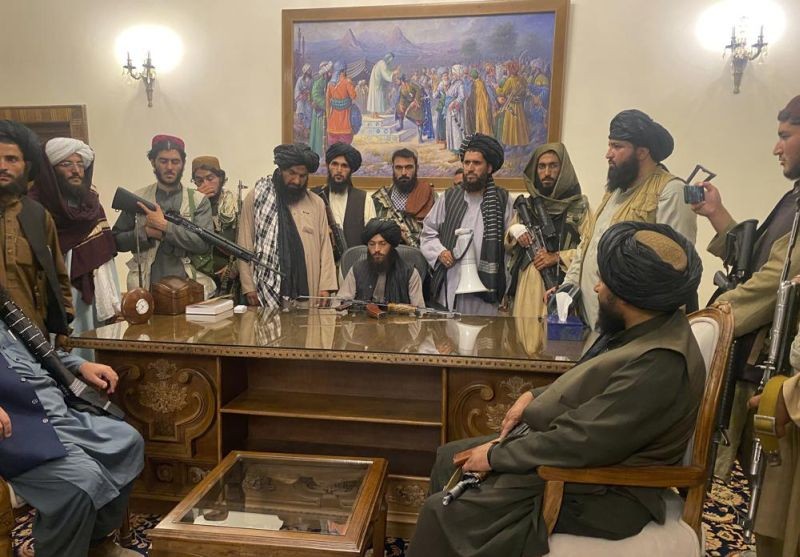 In this Aug. 15, 2021 file photo, Taliban fighters take control of Afghan presidential palace in Kabul, Afghanistan, after President Ashraf Ghani fled the country. (AP File Photo)