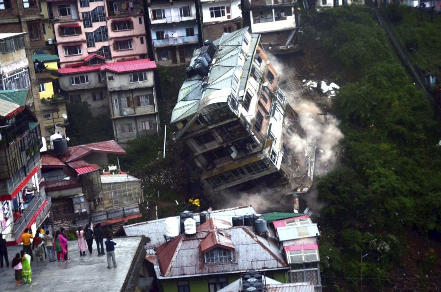 Shimla: A building collapses following heavy rains in Shimla, Thursday, Sept. 30, 2021. (PTI Photo)