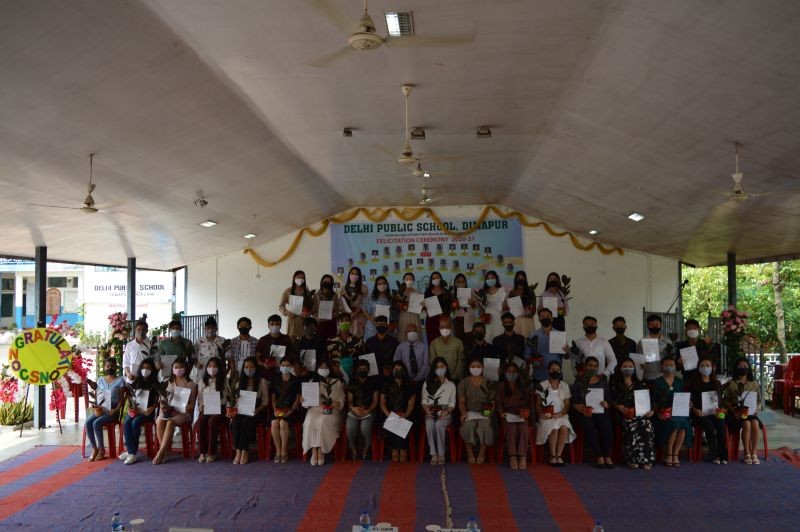 The AISSCE toppers with school faculty after the felicitation programme on September 4. (Photo Courtesy: DPS)