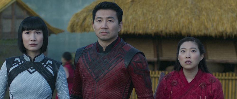 This image released by Marvel Studios shows Meng'er Zhang, Simu Liu and Awkwafina in a scene from "Shang-Chi and the Legend of the Ten Rings." (Marvel Studios via AP)