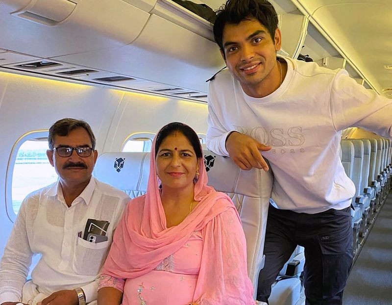 **EDS: TWITTER IMAGE POSTED BY @Neeraj_chopra1 ON SATURDAY, SEPT. 11, 2021** New Delhi: Olympic gold medallist Neeraj Chopra with his parents. (PTI Photo)