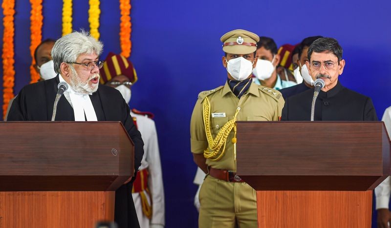 Chennai: Justice Sanjib Banerjee, Chief Justice, High Court of Madras administers the oath of office and secrecy to Tamil Nadu Governor R.N. Ravi at swearing in ceremony, at Raj Bhavan in Chennai, Saturday, Sept. 18, 2021. (PTI Photo/R Senthil Kumar)