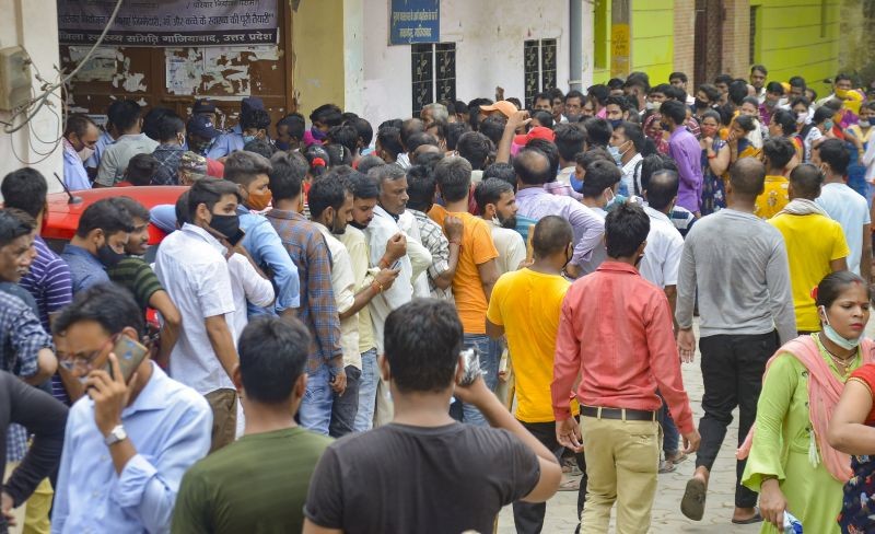 People in a large number wait to receive COVID-19 vaccine dose, in Indirapuarm, Ghaziabad on September 7. (PTI Phto)